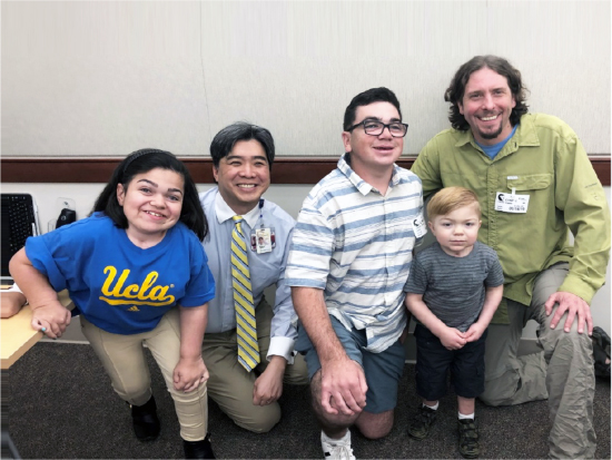 Matt Hirsch with patients in California