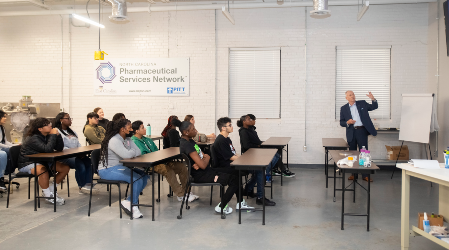 NCBiotech's Mark Phillips teaching students about pharma manufacturing jobs 