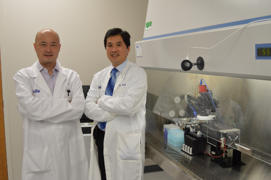Xiling Shen (L) and David Hsu in lab