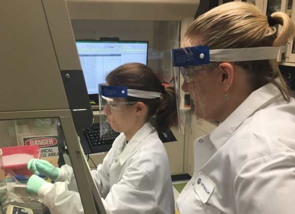 Metabolon scientists wearing personal protective equipment.