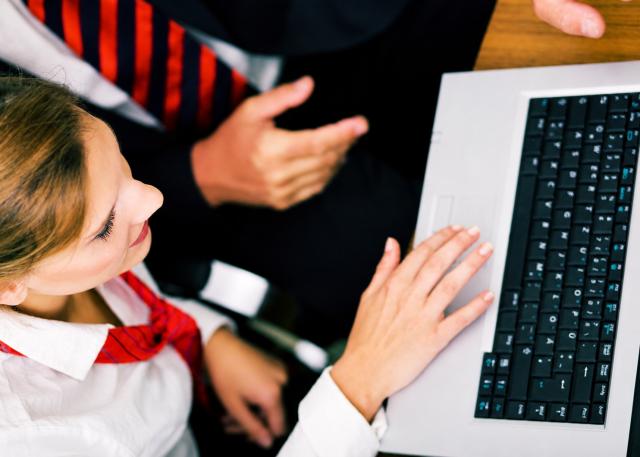 Woman searching careers on a laptop